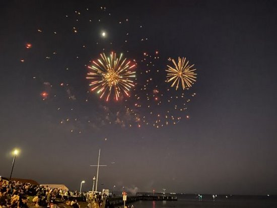 Cowes, Phillip Island, fireworks display with crowd watching. Cowes, Phillip Island, fireworks display with crowd watching.