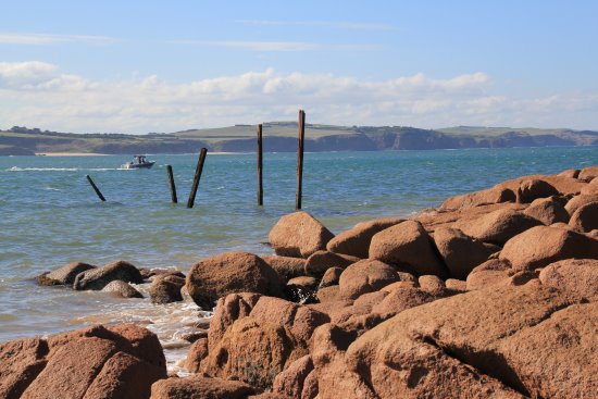 Remains of the old jetty and granite blocks at Cape Woolamai, Phillip Island.