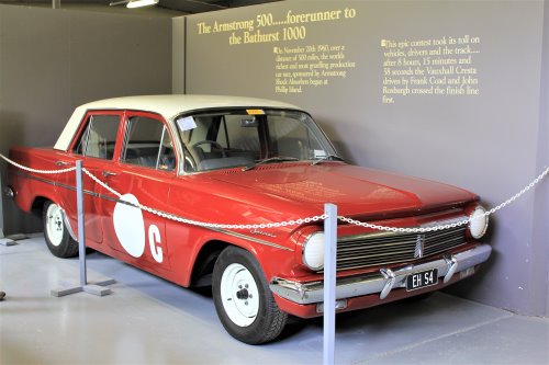 A red EH Holden car which raced in The Armstrong 500, at the History Of Motorsport, Phillip Island Circuit.
