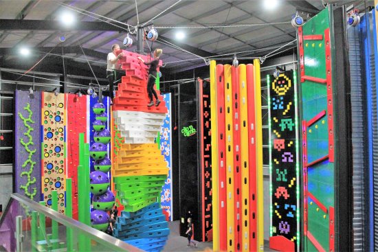 Climbers testing their skills at Clip N Climb, Phillip Island