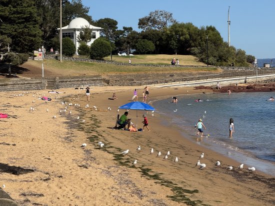 A family on Cowes Beach, Phillip Island.