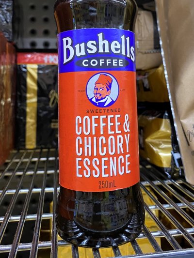 A bottle of Bushells coffee and chicory essence.