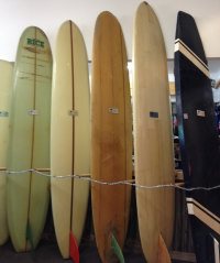 Display of boards from the early 1900's at Islantis Surf Experience