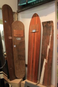 Display of vintage surf boards at Islantis Surf Experience