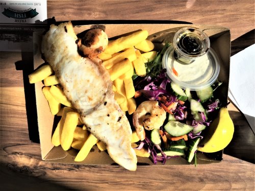 Fish, chips and salad in a container. San Remo Fisherman's Co-op fish and chips