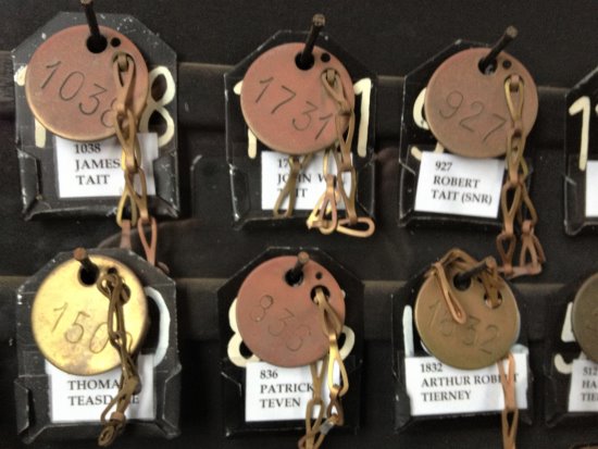 Mine workers number tags from the old State Coal Mine at Wonthaggi. Wonthaggi Coal Mine miners name/number tags